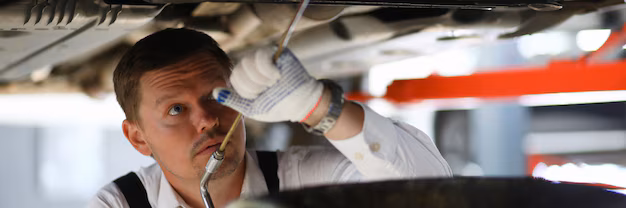 auto-mechanic-repairing-car-repair-service-station